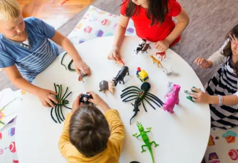 Kids playing at a table