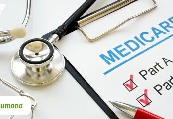 Photo of a clipboard with a pen and medicare verbiage