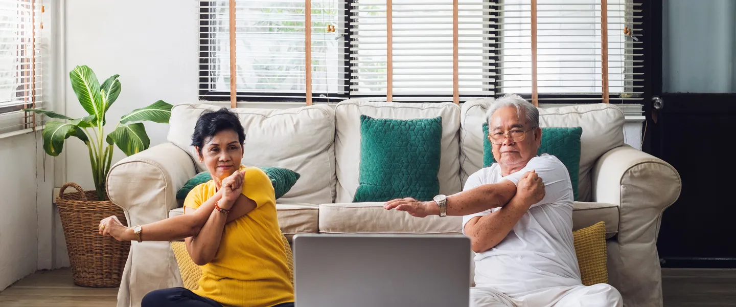 couple doing yoga virtually