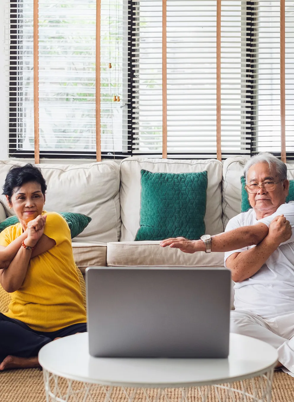 couple doing yoga virtually