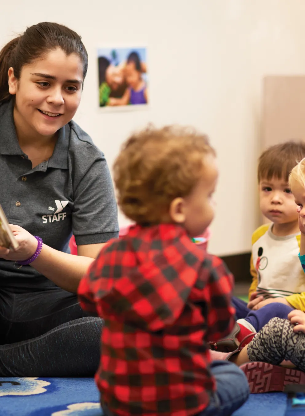 Adult playing with children