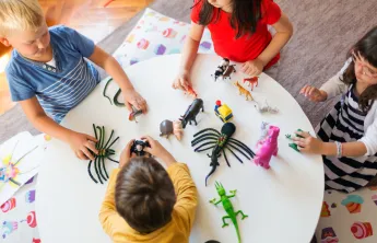 Kids playing at a table