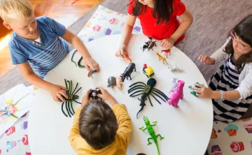 Kids playing at a table